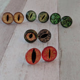 Dinosaur stud earrings, dinosaur eyes, dinosaur lover gifts, novelty earrings, gifts for dinosaur lovers, dinosaur accessories, science gift