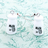 Milk earrings, cute earrings, kawaii earrings, kawaii jewelry, kawaii gifts, novelty earrings, fun quirky gifts, cow farmer gifts, cow lover