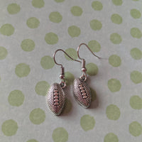 Rugby ball earrings,